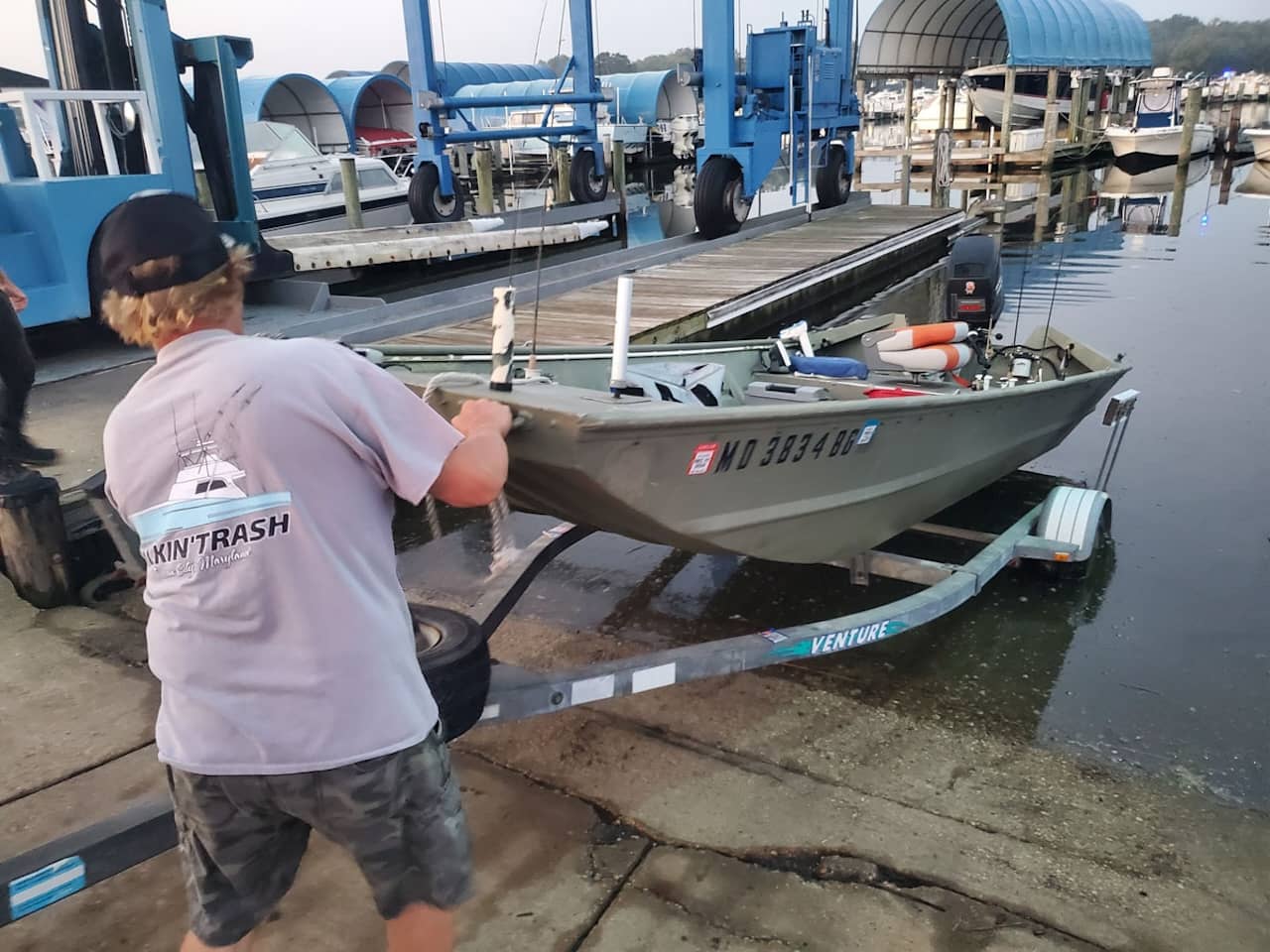 When the boat reaches the water have your assistant grab the mooring line(s).