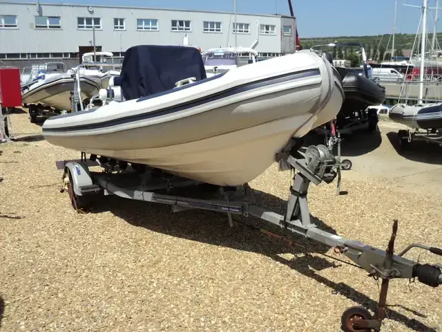 Ballistic Used  5.5m RIB with Evinrude 90Hp Outboard and Trailer