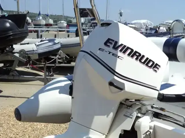 Ballistic Used  5.5m RIB with Evinrude 90Hp Outboard and Trailer