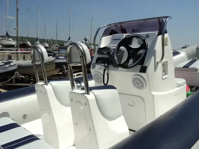 Ballistic Used  5.5m RIB with Evinrude 90Hp Outboard and Trailer