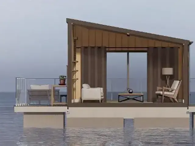 Wide Beam Waterfront Living Floating Home