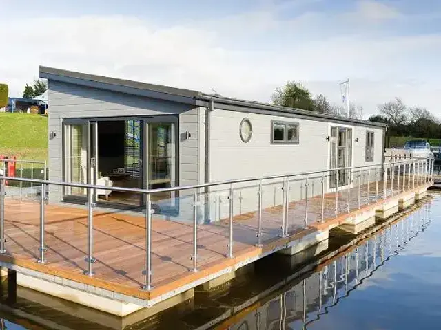 Wide Beam Waterfront Living Floating Home