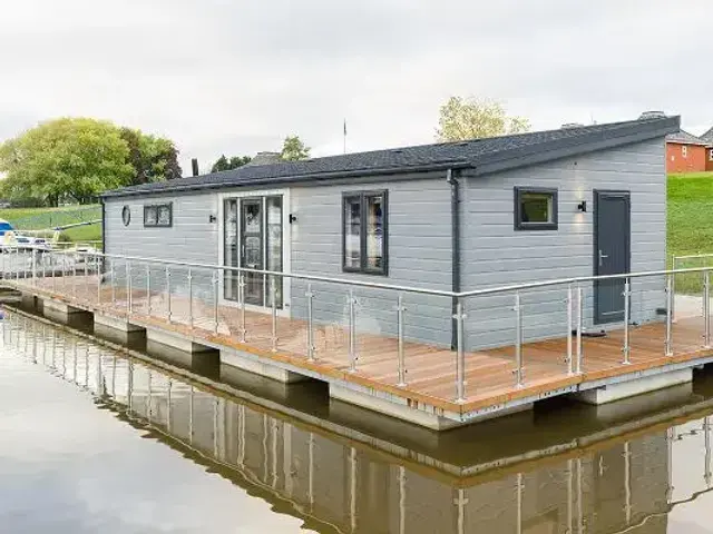 Wide Beam Waterfront Living Floating Home