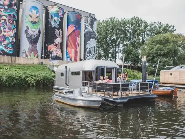 The Coon 1000 Houseboat