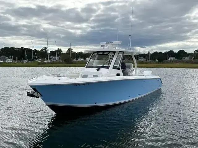 Pursuit S 328 Sport