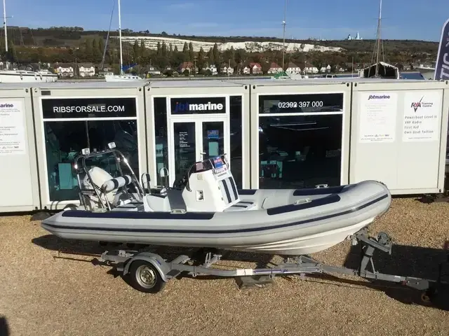 Ballistic Used  5.5m RIB with Evinrude 90Hp Outboard and Trailer